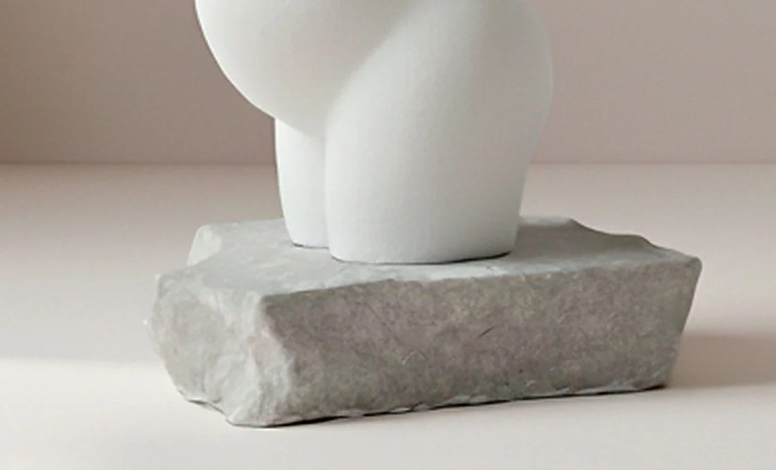 Stork Shape figur på flad base i natursten