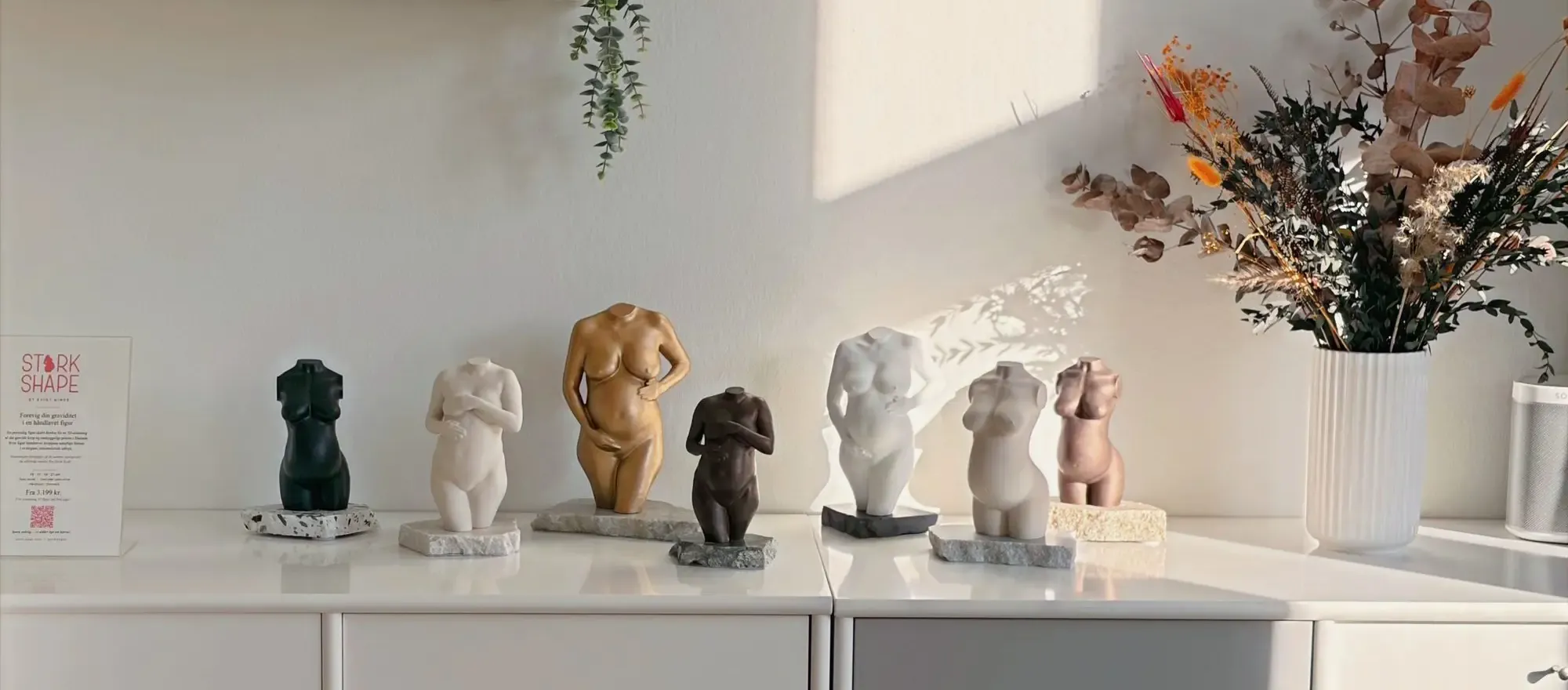Stork Shape figures in different colours and sizes on display at the clinic